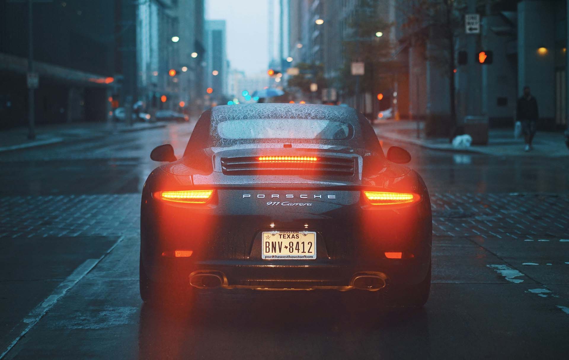 gray Porsche car on road