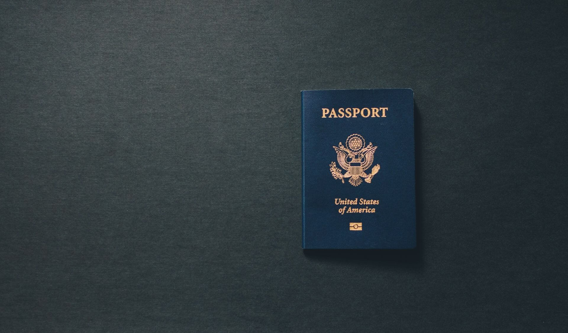 passport on a black surface