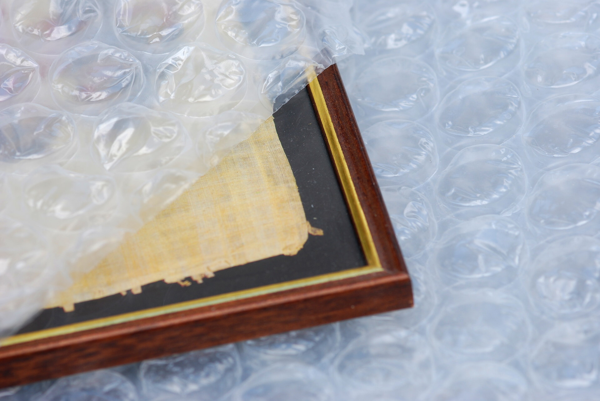 A frame wrapped in bubble wrap