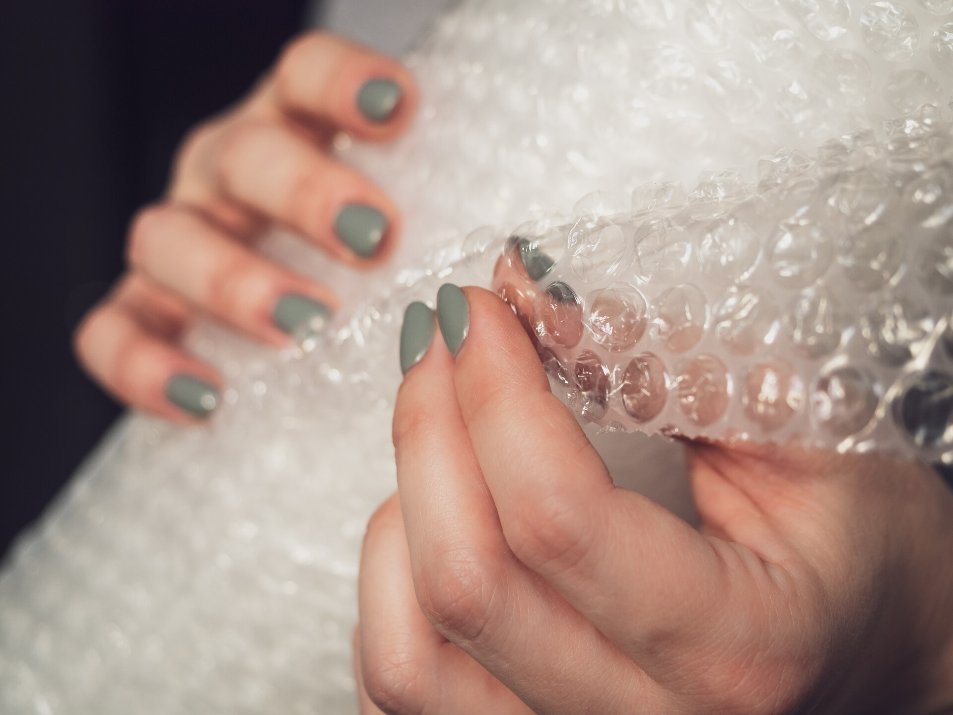 Woman holding bubble wrap